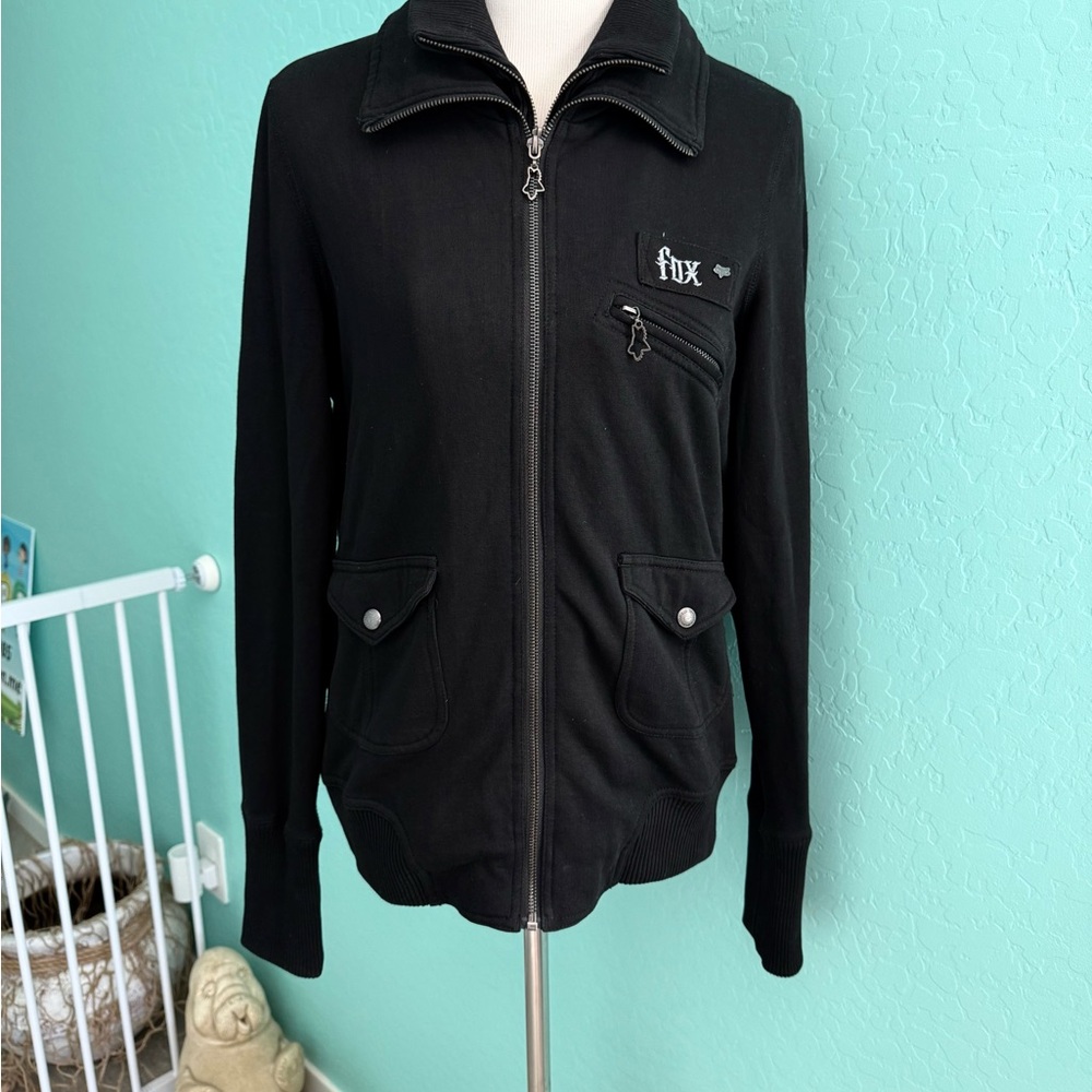 Women's Black Zip-Up Jacket. Dual zipper and medium weight.